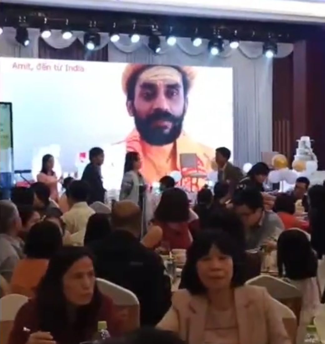 Amit introduced on the main screen at an international gala dinner